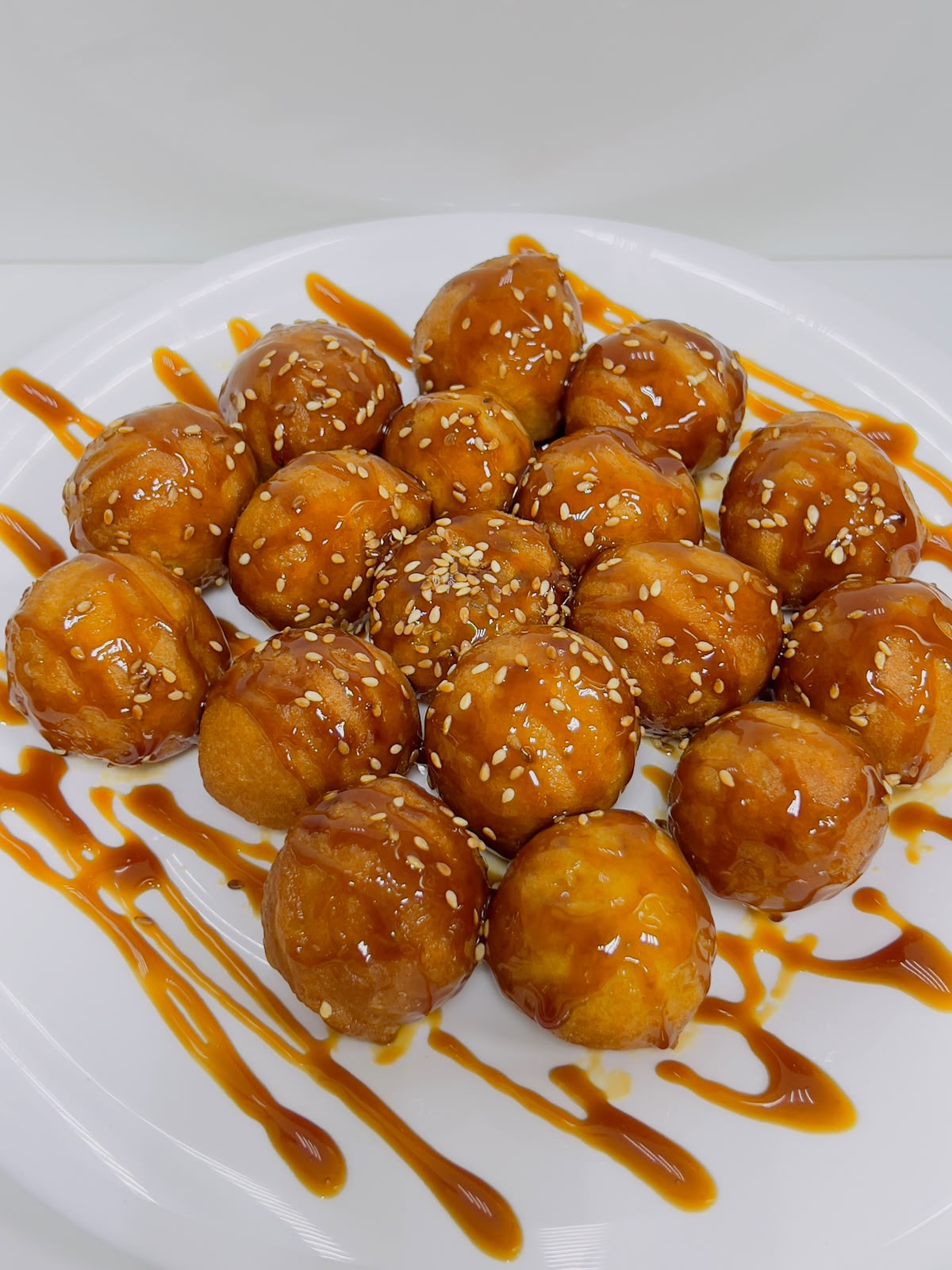 Classic loqaimat with date syrup and sesame