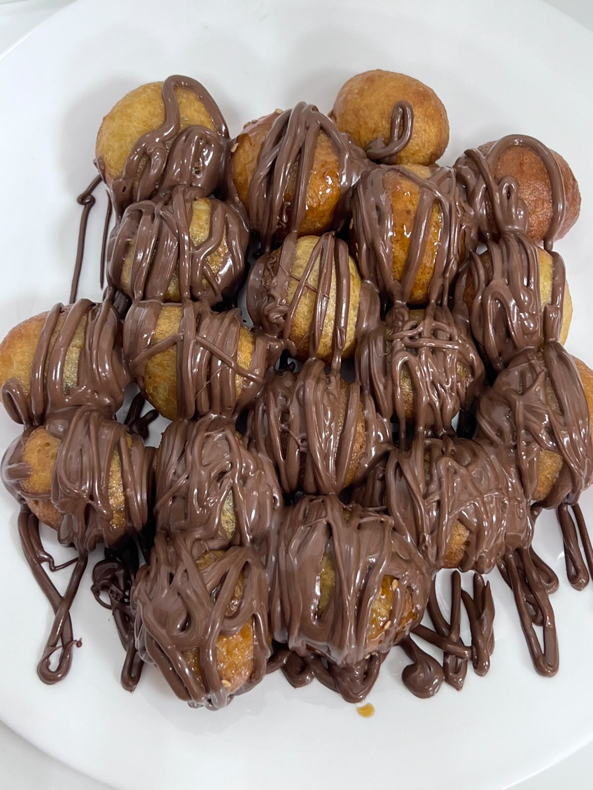 Loqaimat drizzled with chocolate